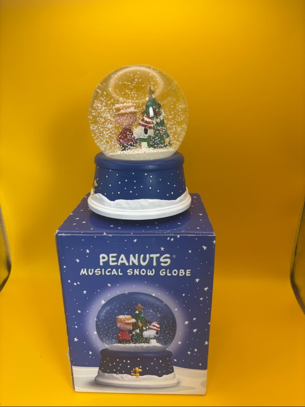 Hallmark Peanuts Blue Musical Snow Globe with Holiday Tree.